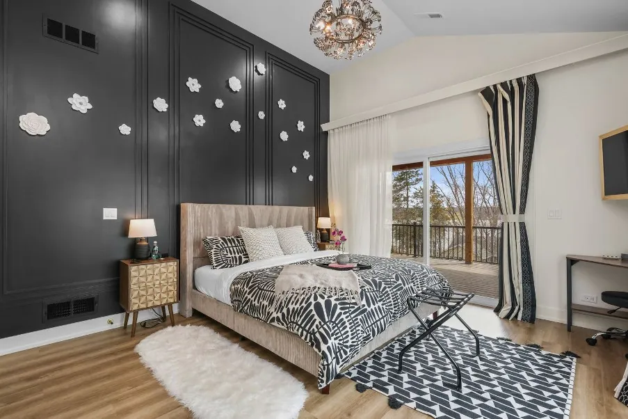 Bedroom with dark feature wall