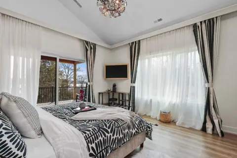 Bedroom with balcony access