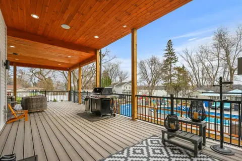 Covered deck with pool view